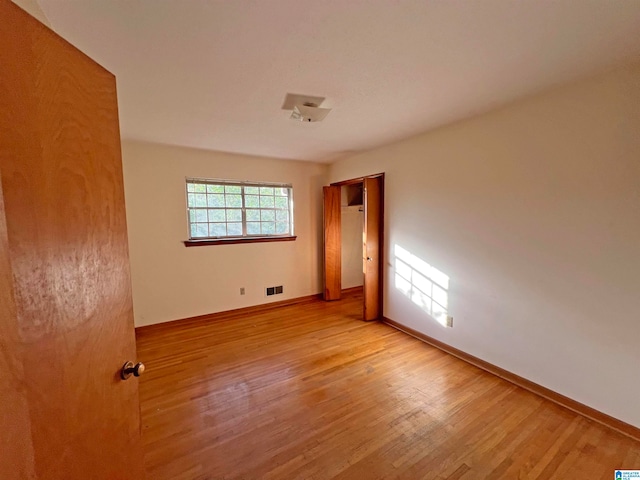 empty room featuring light hardwood / wood-style flooring