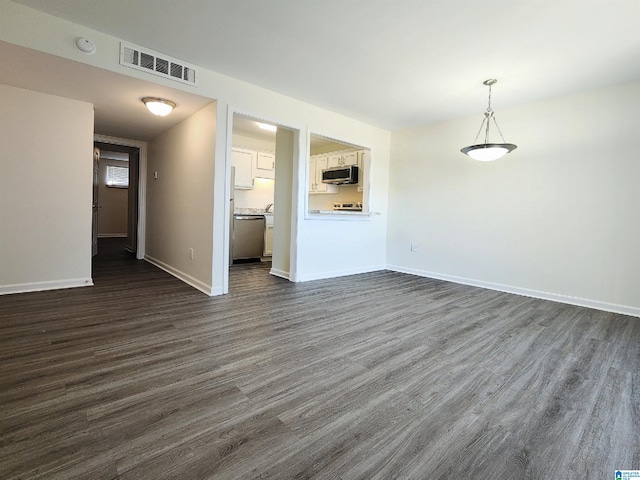 interior space with dark hardwood / wood-style flooring