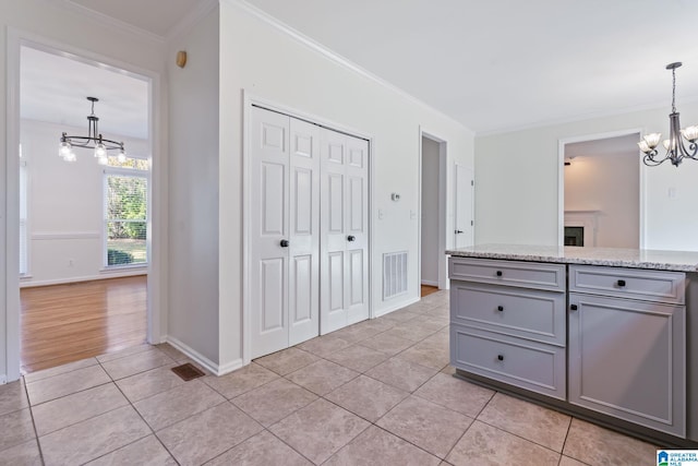 bathroom with hardwood / wood-style floors and ornamental molding