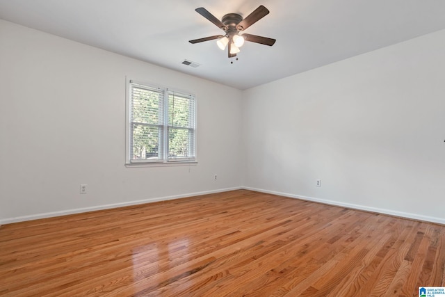 unfurnished room featuring ceiling fan and light hardwood / wood-style flooring