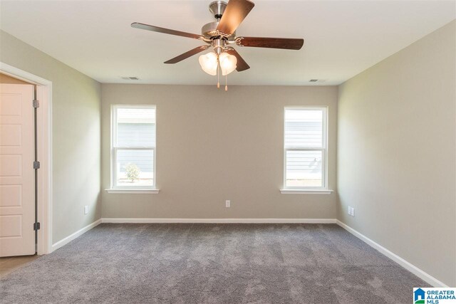 carpeted empty room with ceiling fan