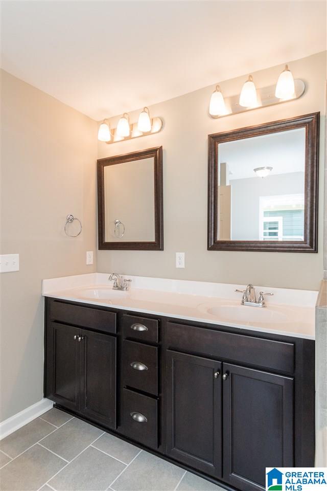 bathroom featuring vanity and tile patterned floors