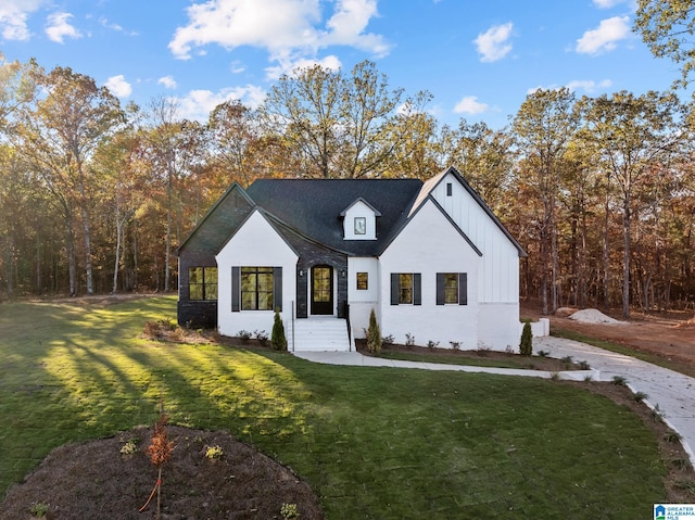 modern farmhouse with a front yard