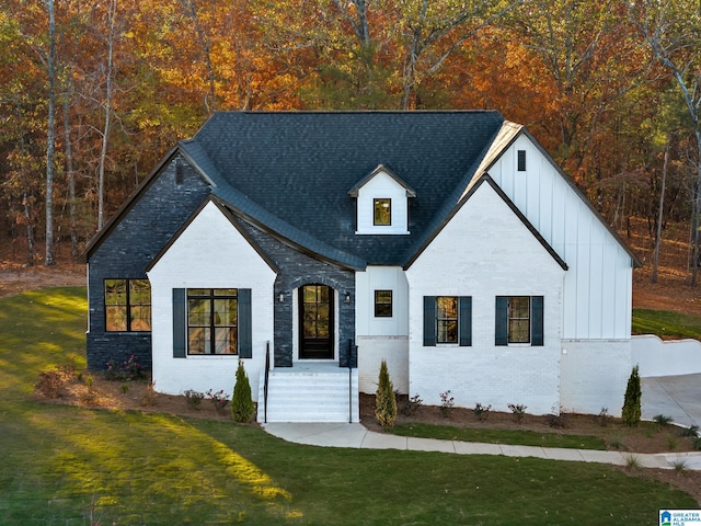 view of front of property with a front lawn