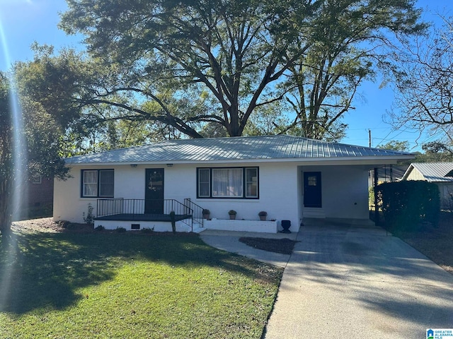 ranch-style home with a carport and a front yard