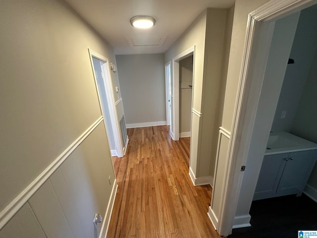 hallway featuring light hardwood / wood-style floors