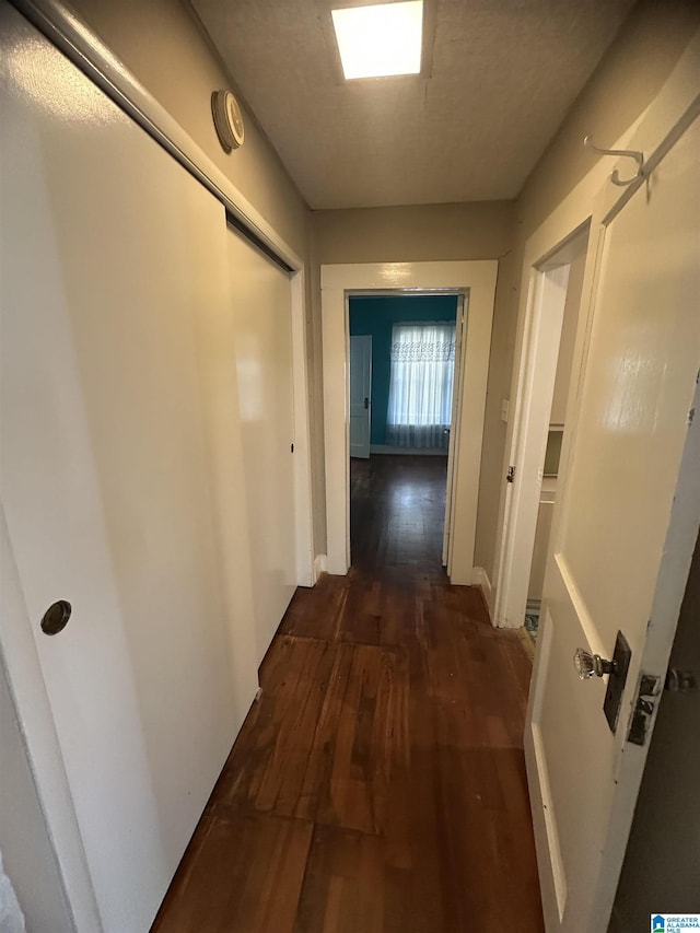 hall featuring dark hardwood / wood-style flooring