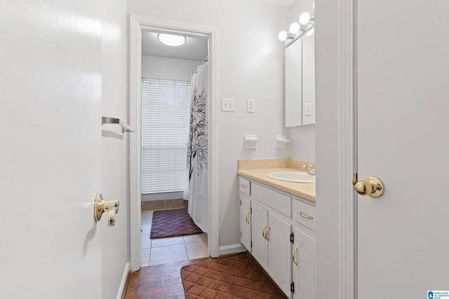 bathroom with vanity and tile patterned floors