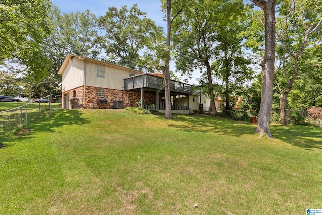 view of yard with a wooden deck