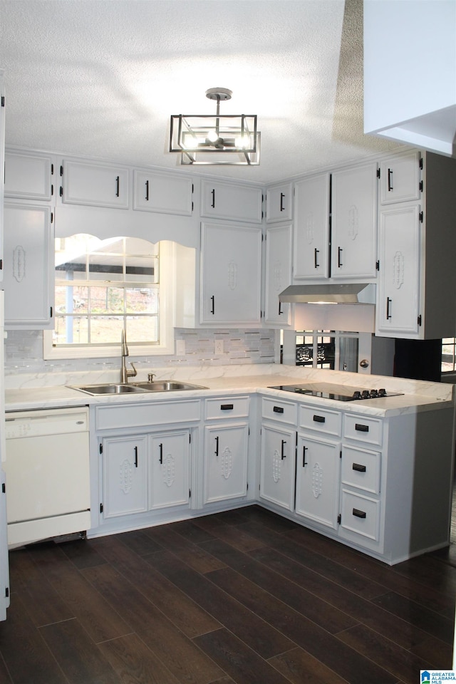 kitchen featuring white dishwasher, white cabinetry, dark hardwood / wood-style floors, and sink