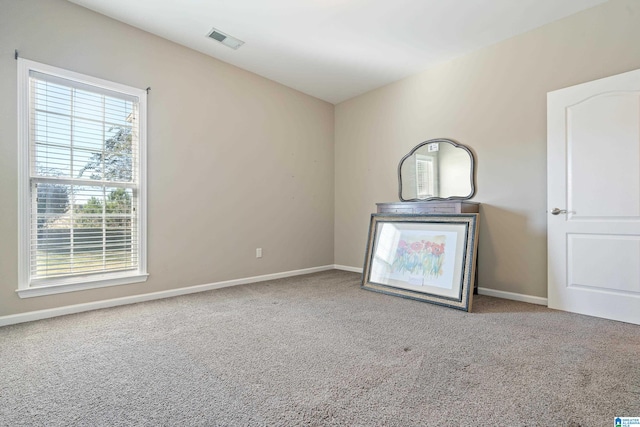 view of carpeted spare room