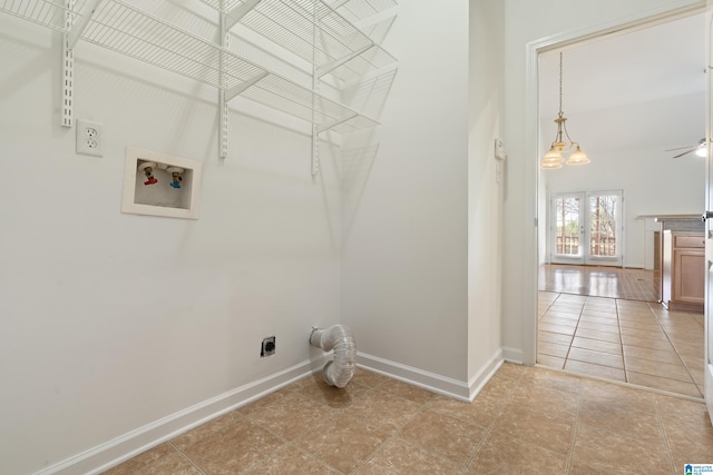 laundry area featuring washer hookup, french doors, light tile patterned flooring, and hookup for an electric dryer