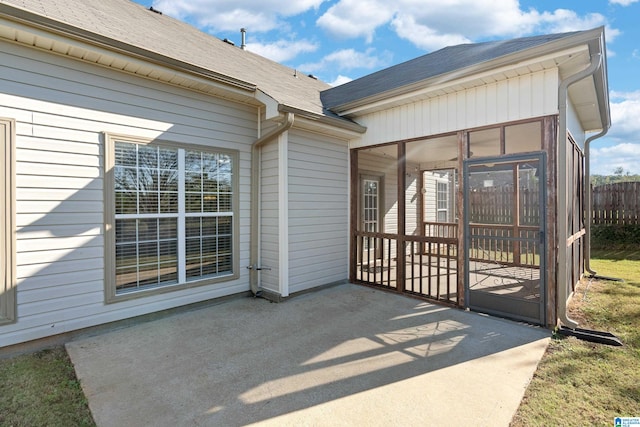 view of patio / terrace with a sunroom