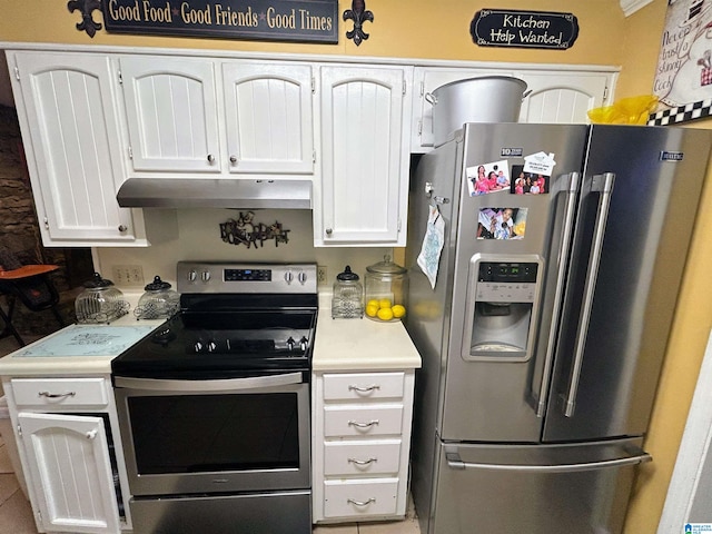 kitchen with appliances with stainless steel finishes and white cabinetry