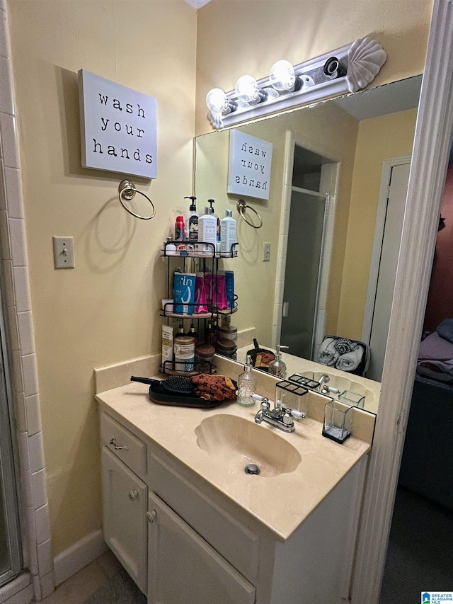 bathroom with vanity and walk in shower