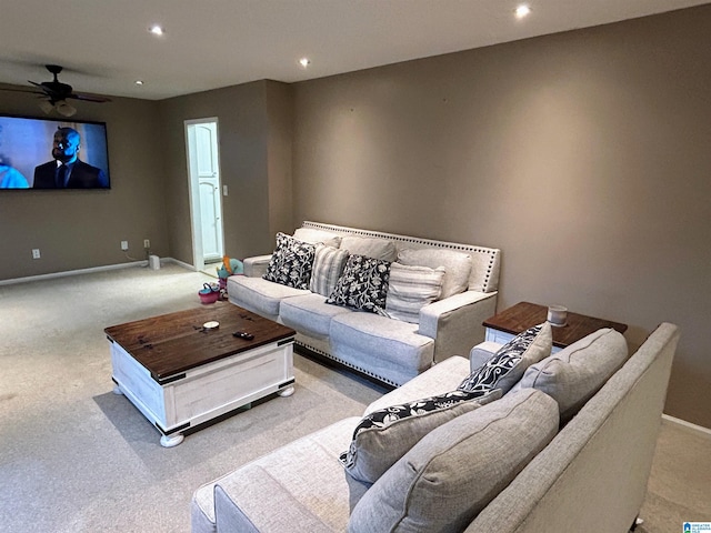 living room with light carpet and ceiling fan