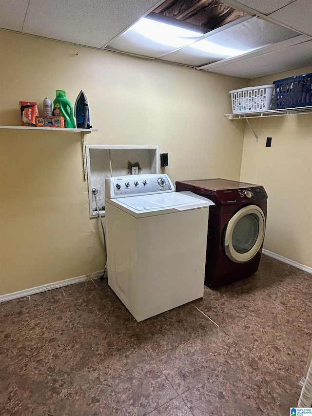 laundry room with separate washer and dryer