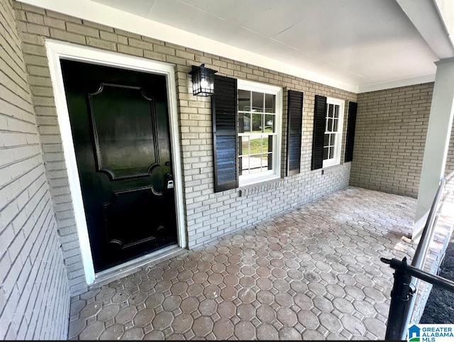 entrance to property with a porch