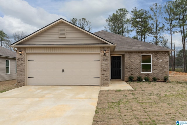 ranch-style home featuring a garage