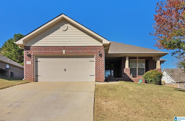 ranch-style house featuring a front lawn and a garage