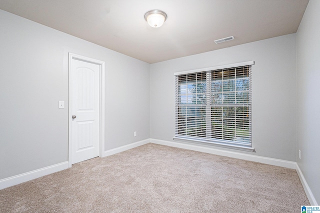 unfurnished room with carpet