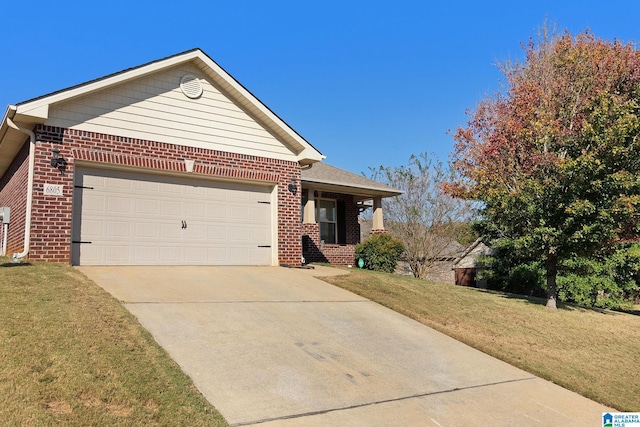 view of front of home featuring a front yard and a garage