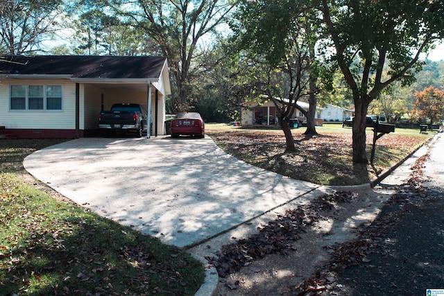 view of property exterior with a carport