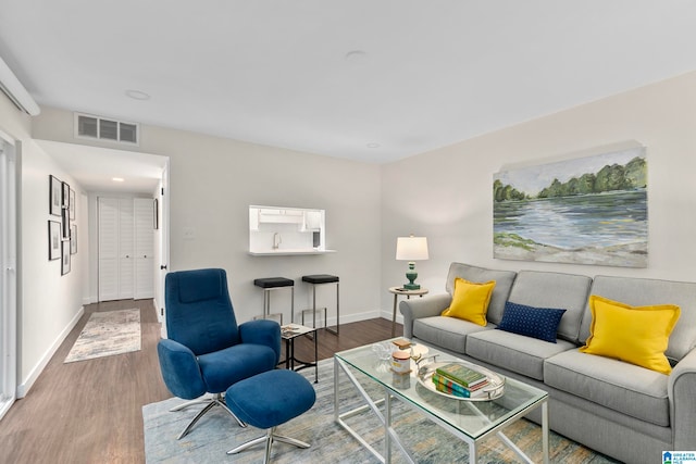 living room with hardwood / wood-style floors