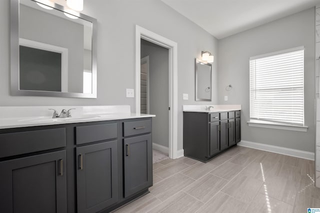 275 Avondale Ln, Pell City, AL 35128 - bathroom with baseboards and two vanities