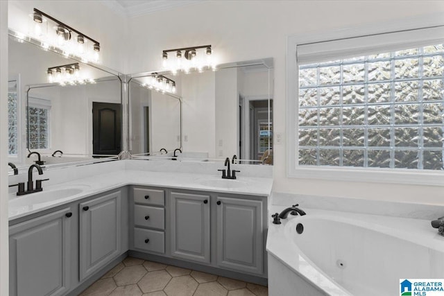 370 Pats Way, Springville, AL 35146 - bathroom featuring tile patterned floors, double vanity, a whirlpool tub, and ornamental molding