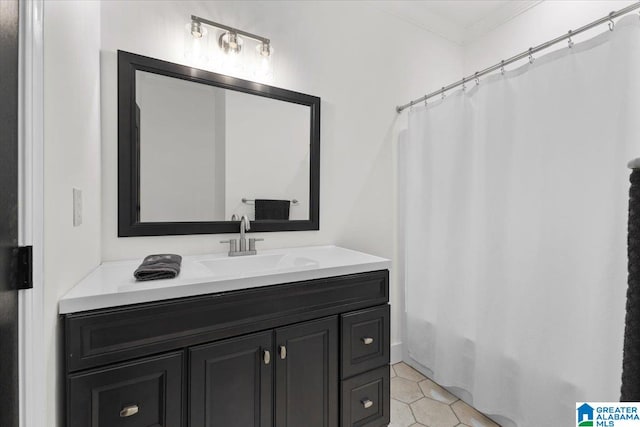 bathroom with vanity and crown molding