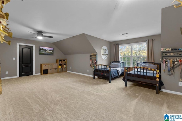 living area with lofted ceiling, light carpet, and ceiling fan