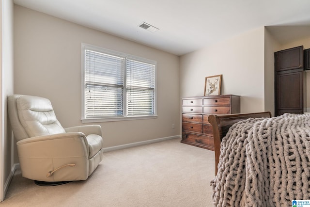 bedroom with light carpet