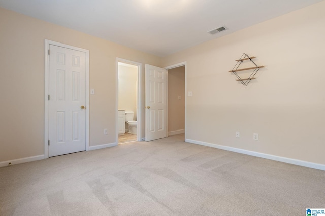 401 El Camino Real, Chelsea, AL 35043 - unfurnished bedroom with light carpet, connected bathroom, and baseboards