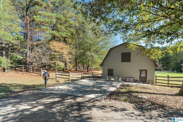 401 El Camino Real, Chelsea, AL 35043 - view of side of property featuring a barn, fence, an outbuilding, and a gambrel roof