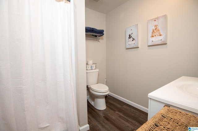 401 El Camino Real, Chelsea, AL 35043 - bathroom featuring wood finished floors, toilet, baseboards, a sink, and curtained shower