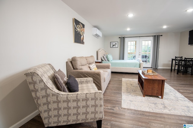 living room with a wall unit AC, wood-type flooring, and french doors