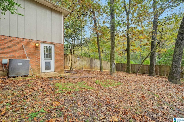 view of yard with central AC unit