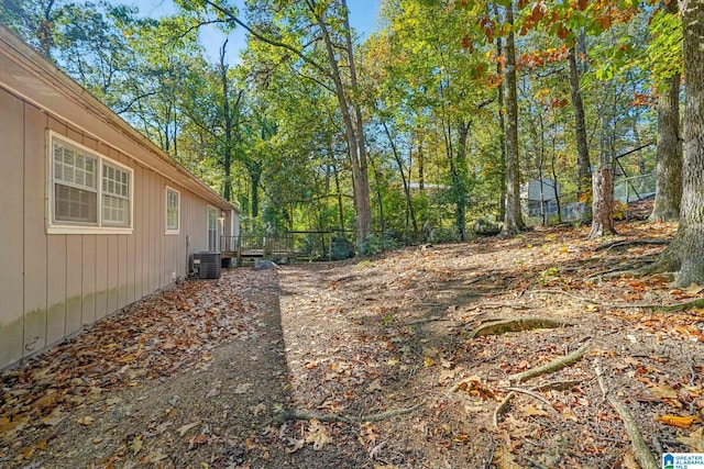 view of yard featuring central AC