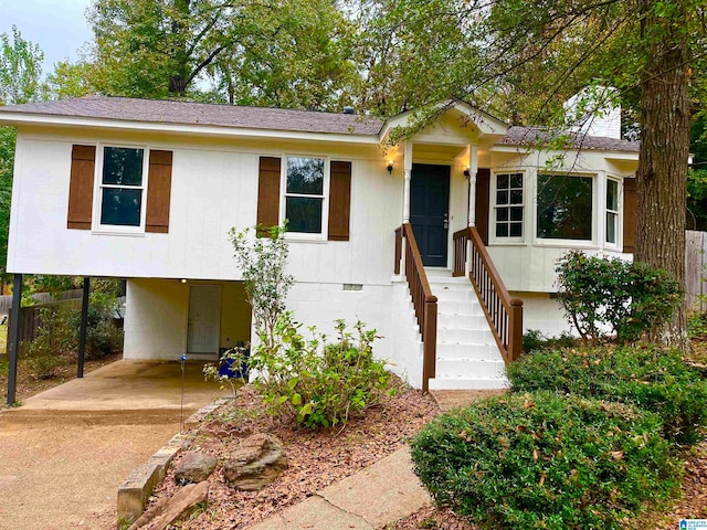 view of front of house with a carport