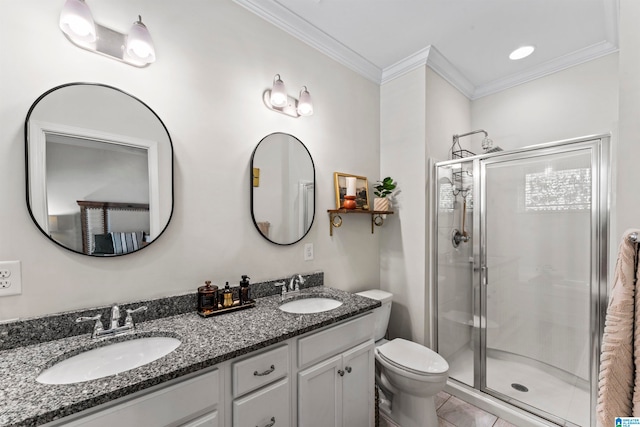 bathroom featuring toilet, tile patterned flooring, ornamental molding, vanity, and a shower with shower door