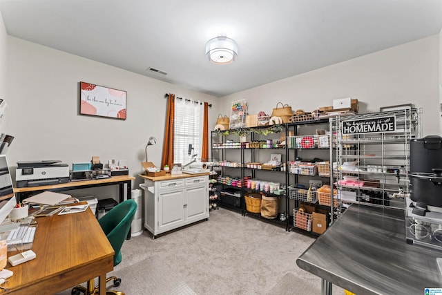 home office with light colored carpet