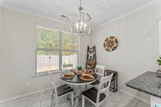 dining room featuring ornamental molding, light tile patterned floors, and a chandelier