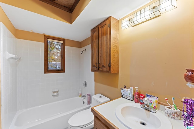 full bathroom with vanity, toilet, and tiled shower / bath combo