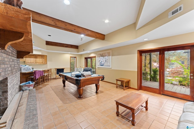 recreation room featuring a wealth of natural light, beam ceiling, pool table, and light tile patterned flooring