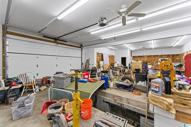 garage featuring a garage door opener and ceiling fan