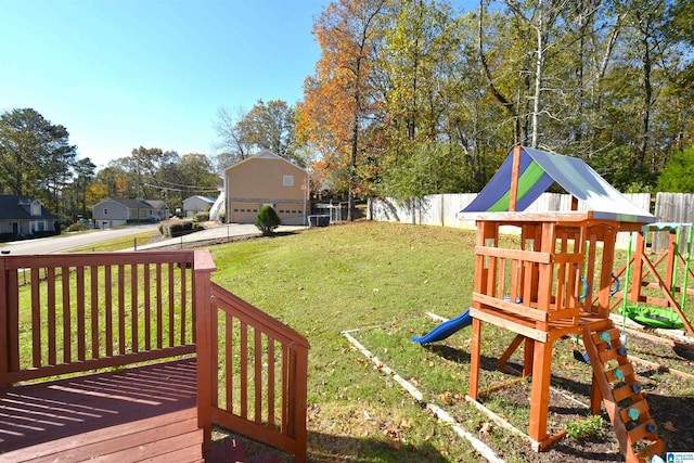 exterior space featuring a playground and a yard