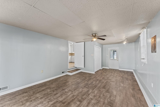 interior space featuring ceiling fan and wood-type flooring