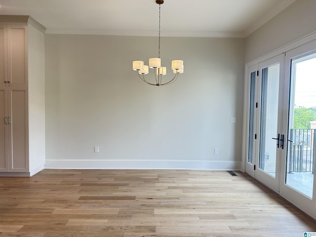 1227 23rd St S Unit B2, Birmingham, AL 35205 - unfurnished dining area featuring crown molding, french doors, a chandelier, light wood-style floors, and baseboards