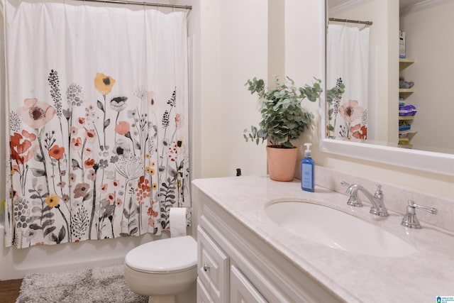 full bathroom with shower / bath combination with curtain, vanity, toilet, and ornamental molding